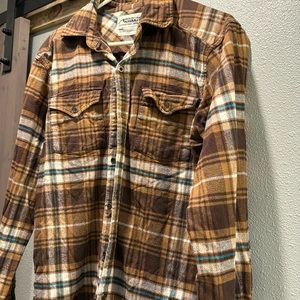 Mountain khakis, fleece button-down.